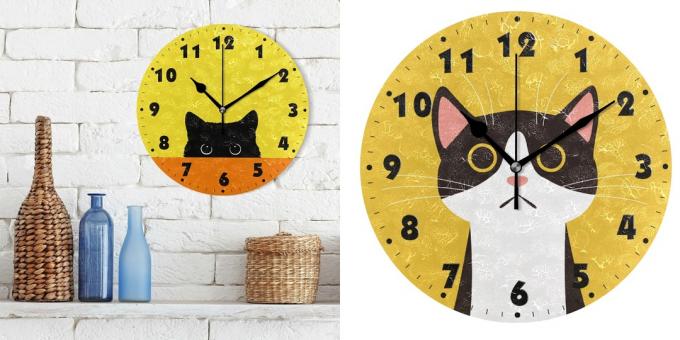 बिल्लियों के साथ दीवार घड़ी 